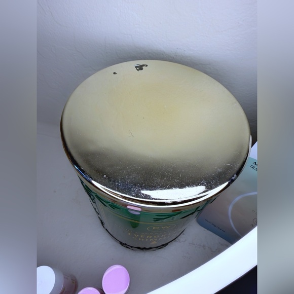 Set of 10: Josie Maran, 2 Laura Geller, 2.6lb Candle, 2 lip products and more - Picture 9 of 9